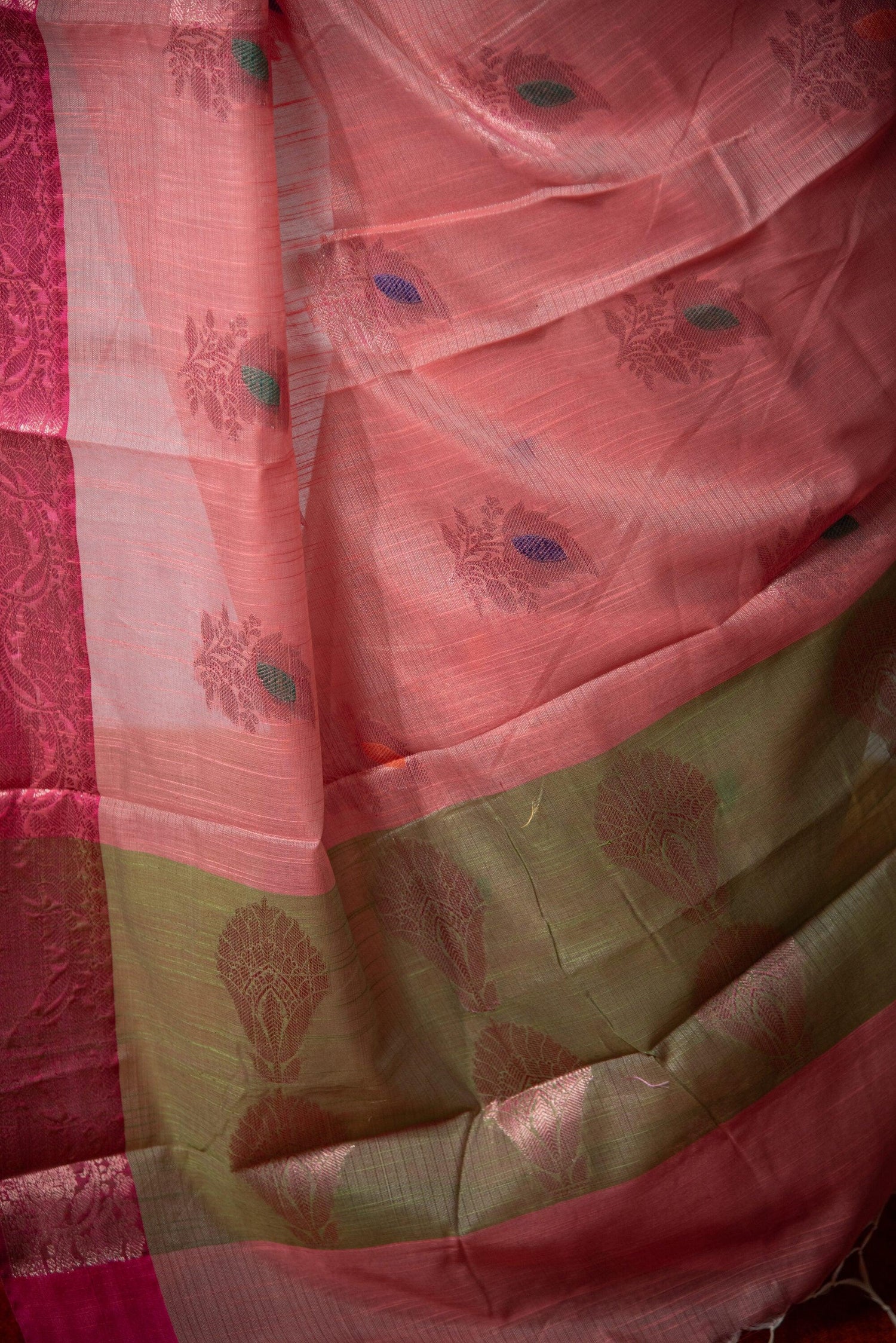 Banarasi cotton saree with dual-tone pink and green, woven floral motifs, and tassel detail